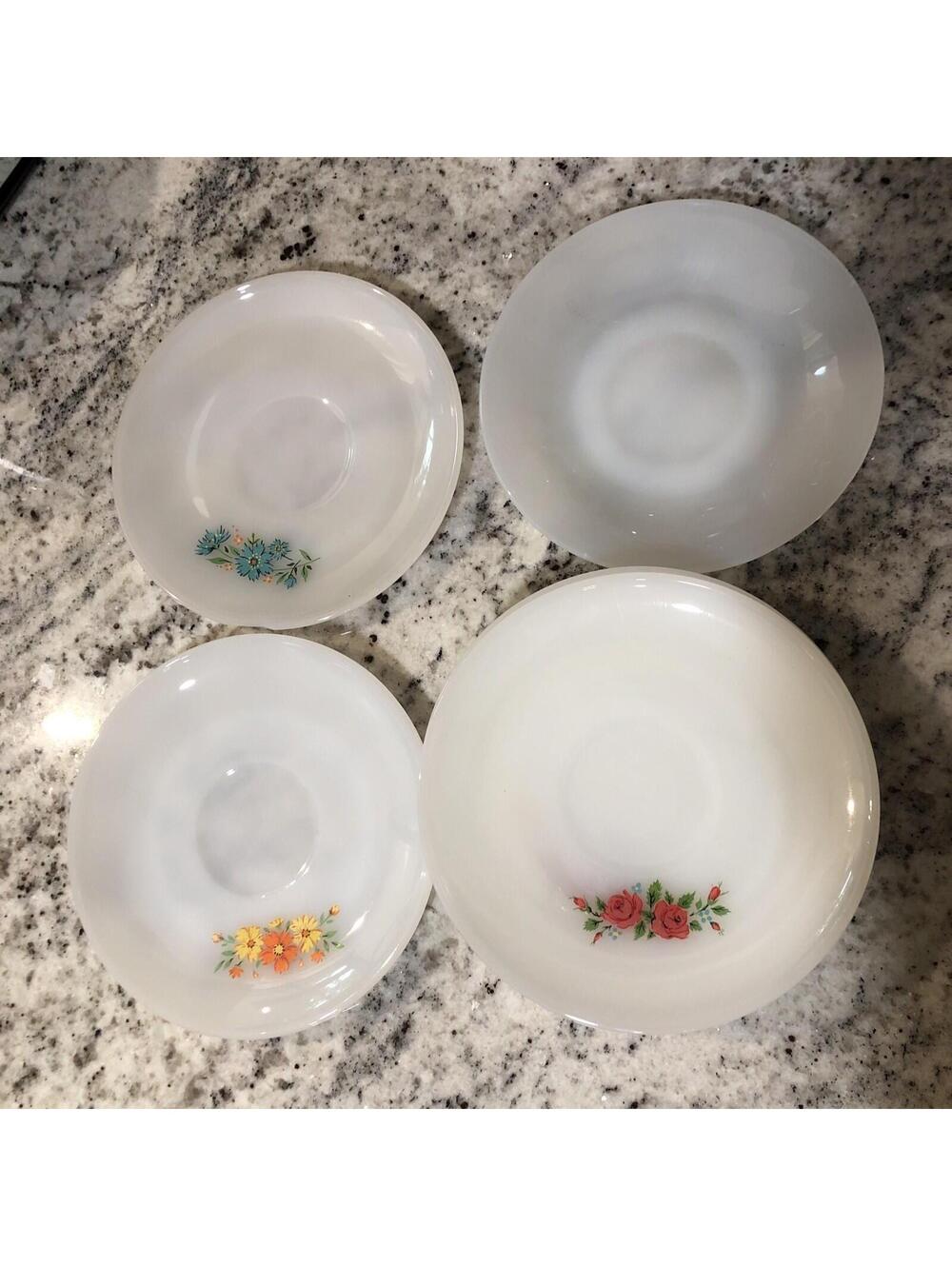 Fire King Milk Glass Floral Saucer Set of 8 Assorted. Blue floral chipped(pic.)